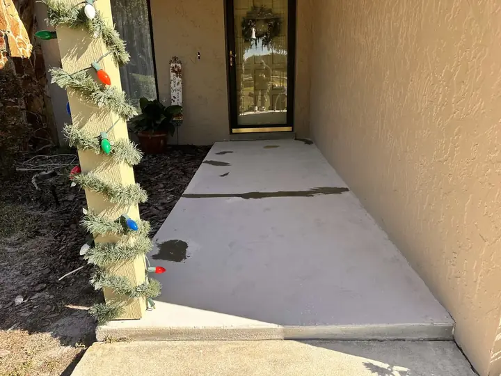Side walkway prepped for an epoxy floor coating