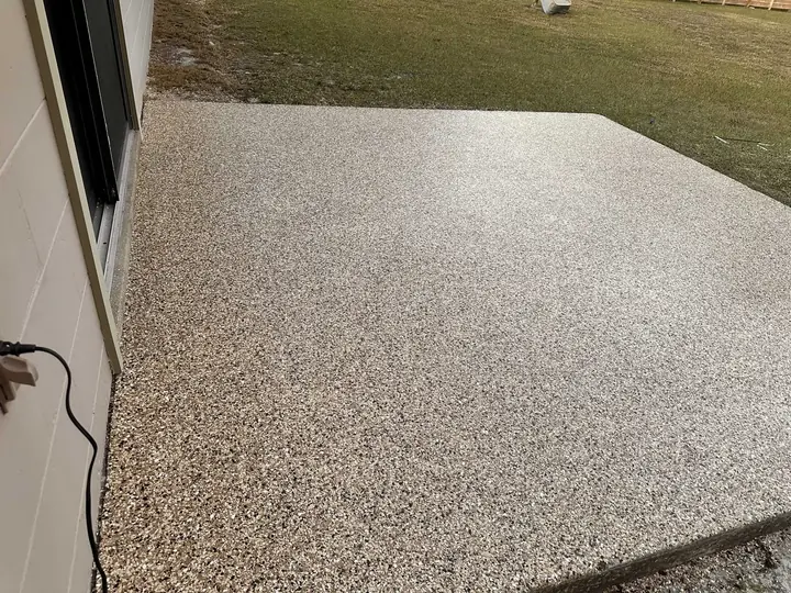 Completed gray flake epoxy patio