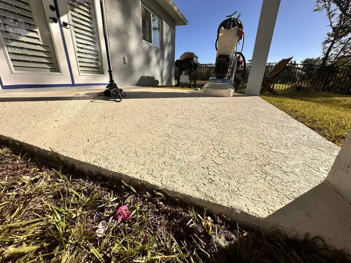 Outdoor epoxy flake patio at dusk