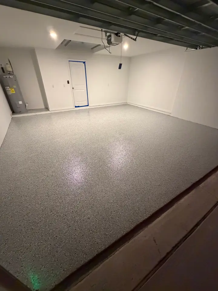 Finished flake epoxy garage floor with a glossy finish