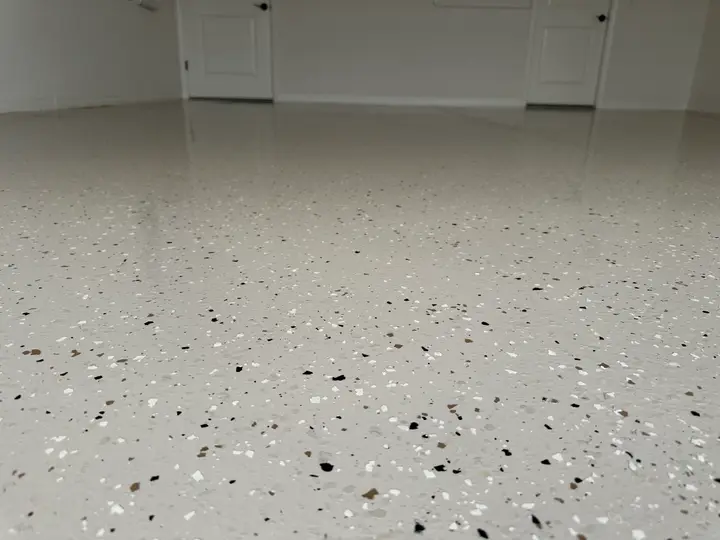 White epoxy floor with black flake